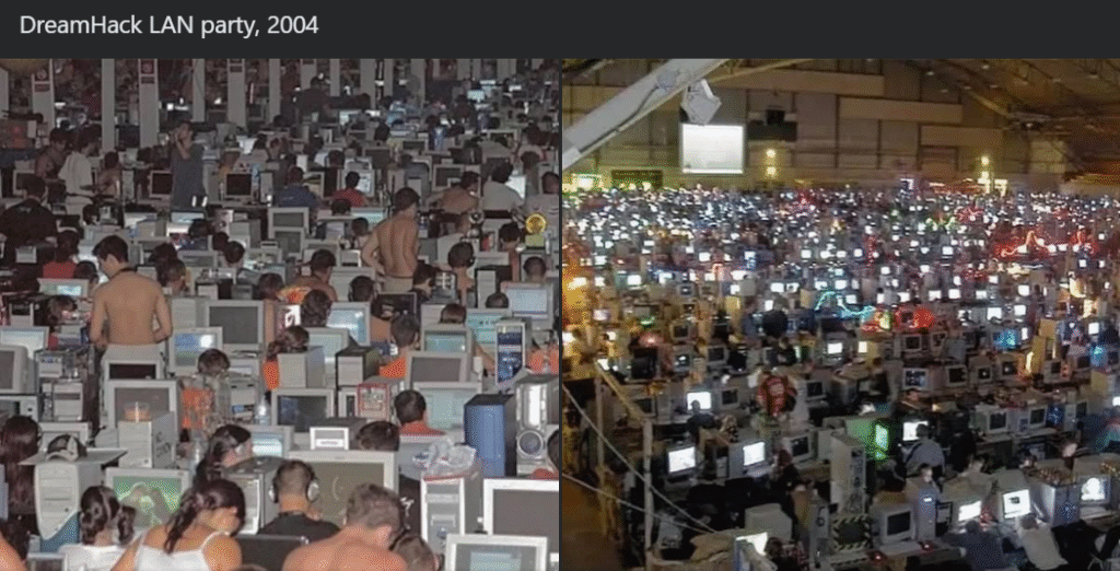 Massive LAN party at DreamHack 2004 showing rows of gamers at desktop computers in a packed indoor venue, highlighting early esports culture and community gaming.